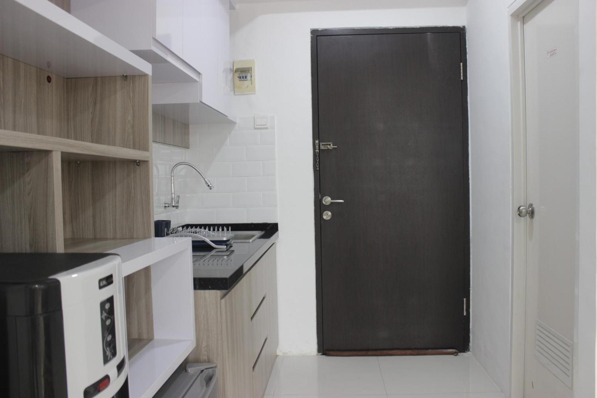 Spacious And Modern At Grand Afrika By Travelio Apartemen